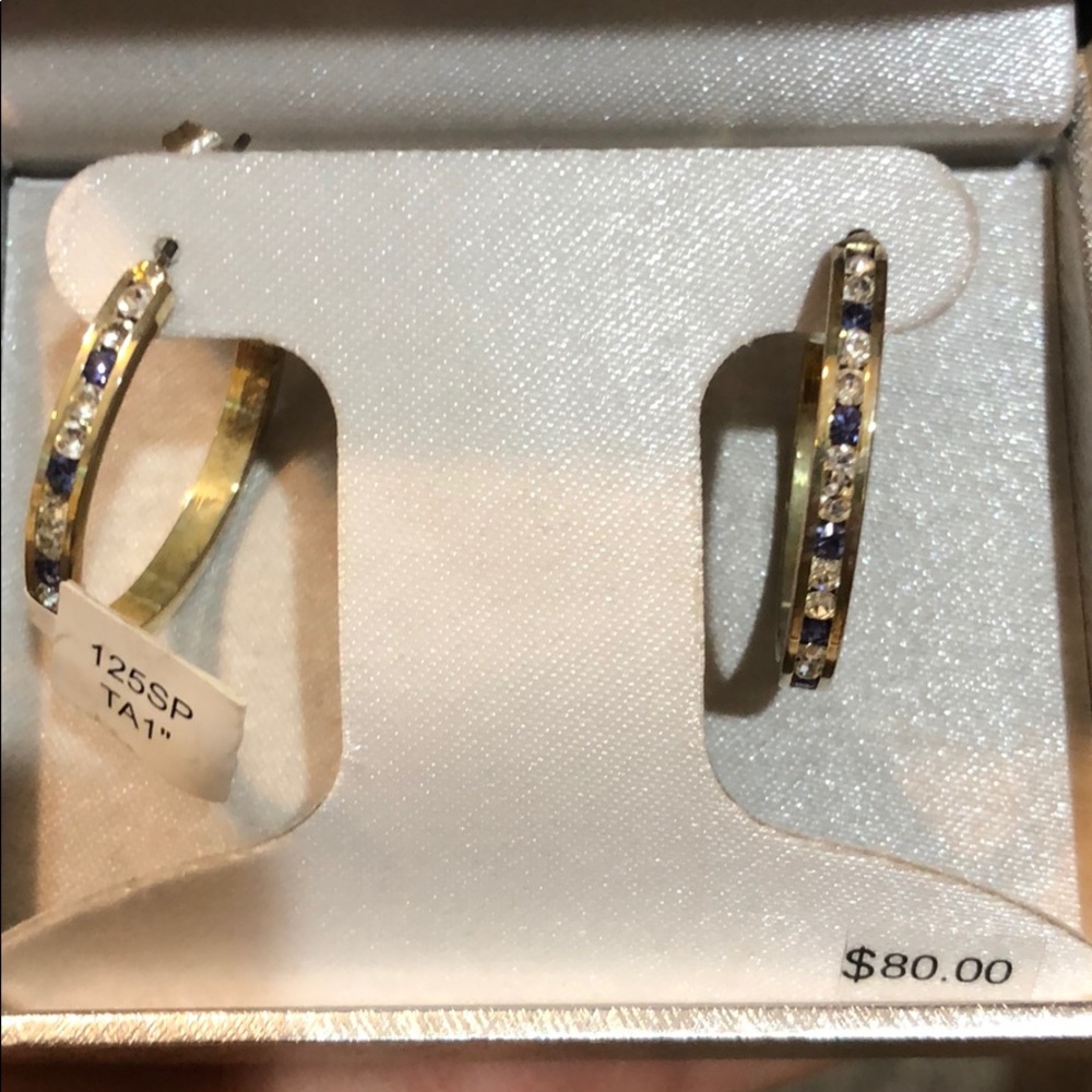 Never worn hoop earrings
